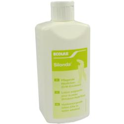 Eine weiße Flasche mit einer grünen Aufschrift enthält eine pflegende Hautlotion.
